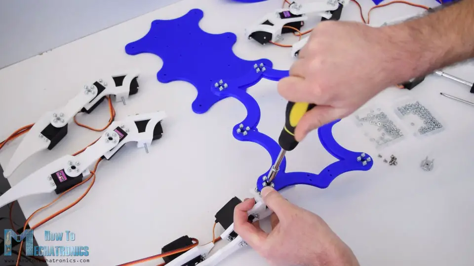 attaching the legs to the hexapod body