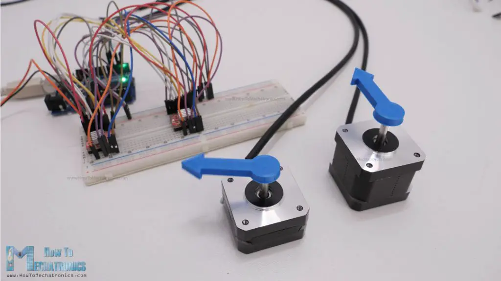 Controlling two stepper motors with acceleration and deceleration